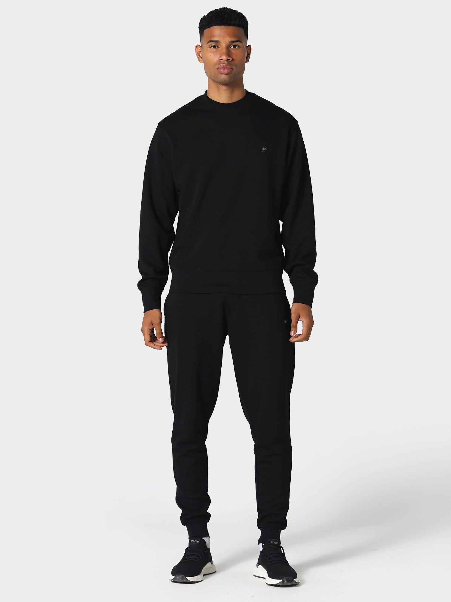 Black sweatshirt with white shirt best sale